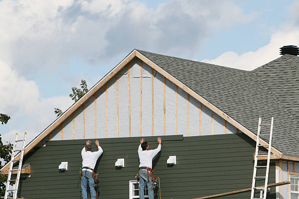 Professional Storm Damage Siding Repair technician working in Leicester, NC
